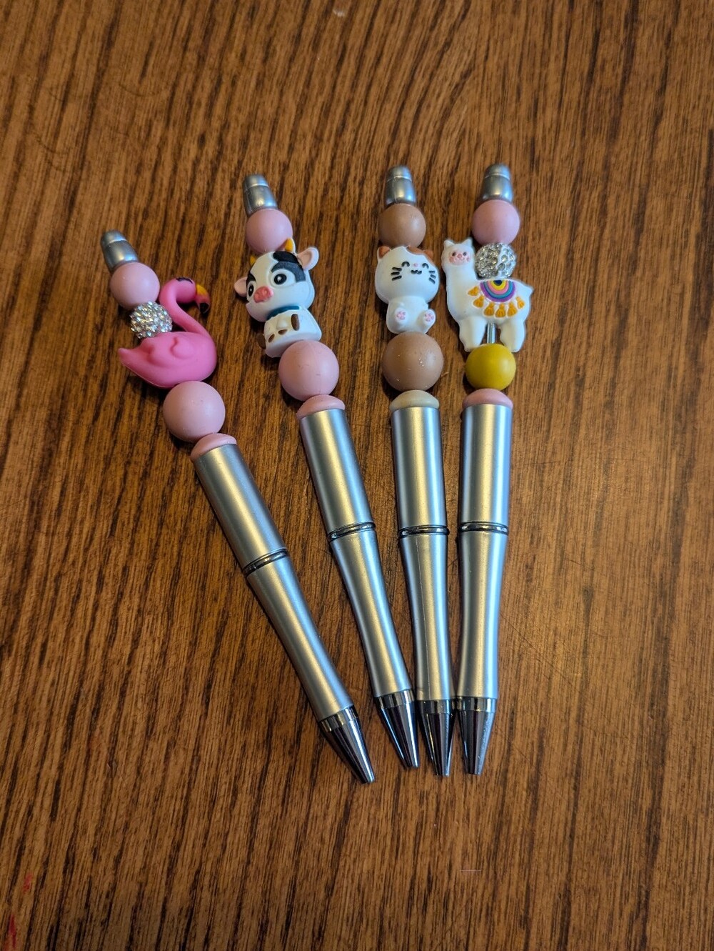 4 animal pens with ink refills